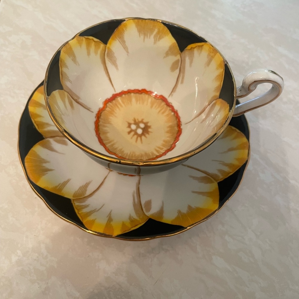 Antique tea cup and saucer - flower